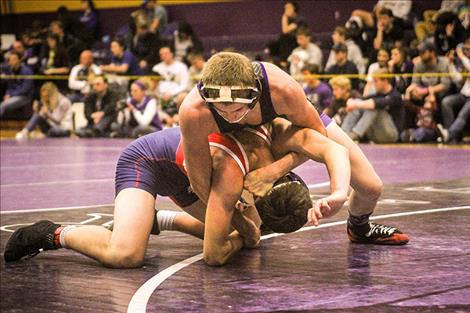 Pirates’ Parker Adler (138) works to gain control of his opponent during the Owen Invitational on Dec. 3, 2016.
