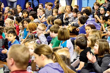 Griz  athlete  Paden  Alexander  speaks to  students  in the same  school  he once  attended. 