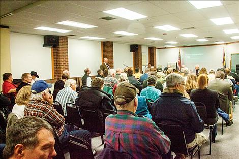 People fill the commissioner’s room in the courthouse to hear about Public Law 280