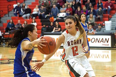 Maidens’ Gabrielle Houle attempts to steal the ball.