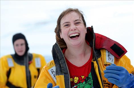 Nethercott laughs as she emerges from the buoyant rescue suit.