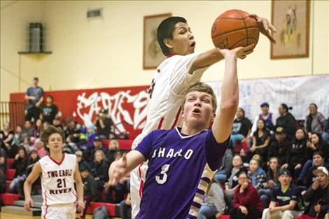 Eagles’ Chasen Curley blocks a shot.