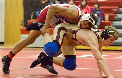 Arlee's Austin Rubel, 145 pounds, wrestles a Florence opponent earlier this season. Rubel took second to Ronan's Kyle Lawson at the Western B-C Divisional wrestling meet last weekend.