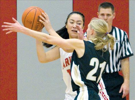 Violet Pablo looks for help under pressure from a Seeley-Swan defender earlier this season.