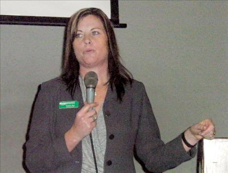 Gypsy Ray, executive director of the Lake County Community Development Corp., speaks at the Polson Chamber of Commerce luncheon last week.