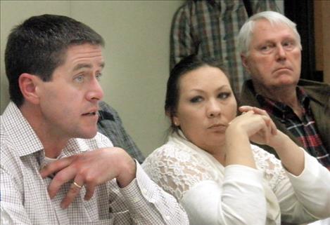 Randy Arnold, a regional supervisor with Montana Fish, Wildlife and Parks, speaks at the Flathead Basin Commission meeting in Polson last week. Also pictured are commissioners Jasmine Brown and Jim Simpson.