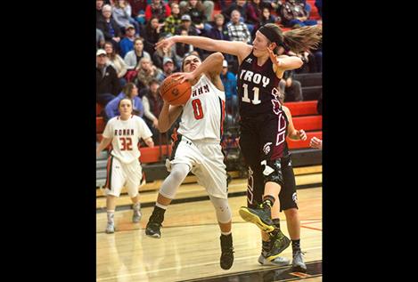 Maiden’s Micalann McCrea drives to the hoop.