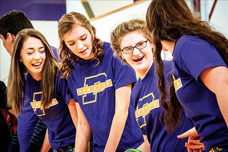 Mercedes Dunkerson, second from right, enjoys a game at the rally.