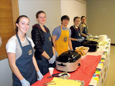 Members of Polson’s Key Club served up “fixins” with buffalo burgers last week at the Kiwanis Club’s 21st annual Buffalo Feed.