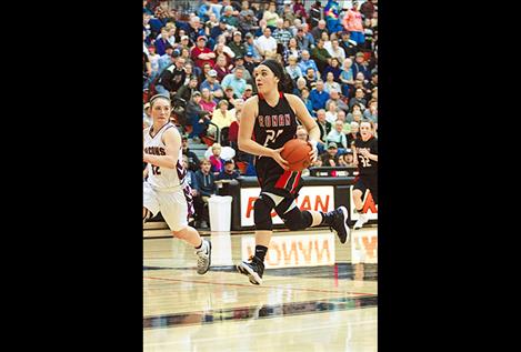 Alicia Camel drives past a defender.