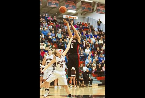 Ronan Maiden Micalann McCrea shoots a jumper from downtown.