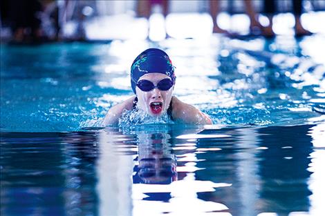 Amelia Stene competes in the 50-yard breaststroke at the Mission Valley Aquatic Center in Polson. ROB ZOLMAN/VALLEY JOURNAL Lake Monster’s swimmer Isabel Seeley competes in the 100-yard breaststroke during the 2017 Montana State Short Course Championship held on Friday at the Mission Valley Aquatic Center in Polson.