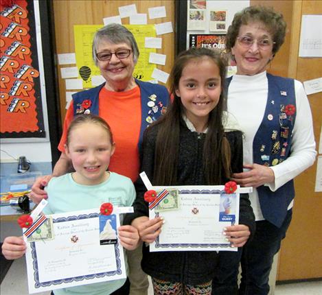 In the front row are Brylie Reum and Natalie Adams. Helen Sorenson and Margaret Fay are in the back row.