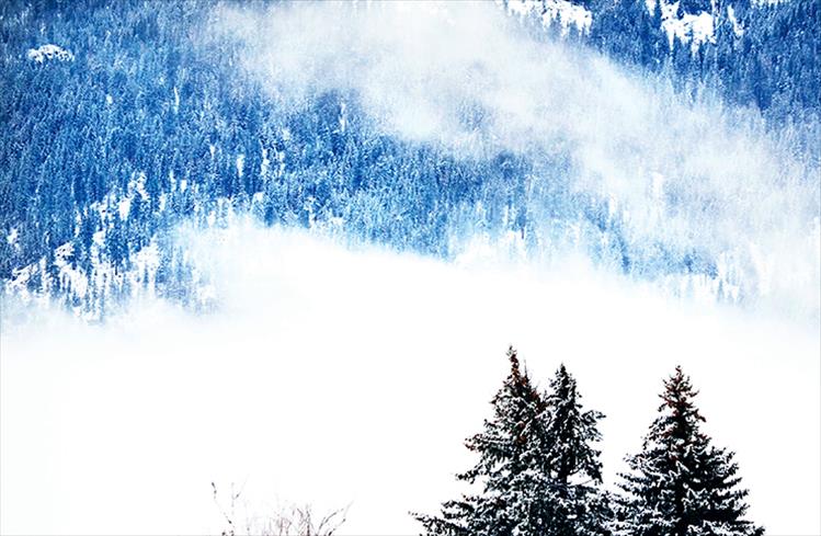 Saturday afternoon's snowstorm moves into the Mission Mountains near St. Ignatius.