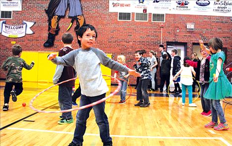 Polson Linderman Elementary student Brandon Shumate hula hoops during Jump Rope for Heart held after school on Wednesday, March 1. The annual event benefits the American Heart Association.