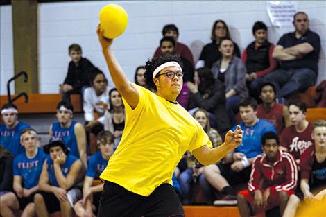 Anthony Camel slams the ball at an opponent.