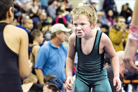 Little grapplers show off their best game faces.