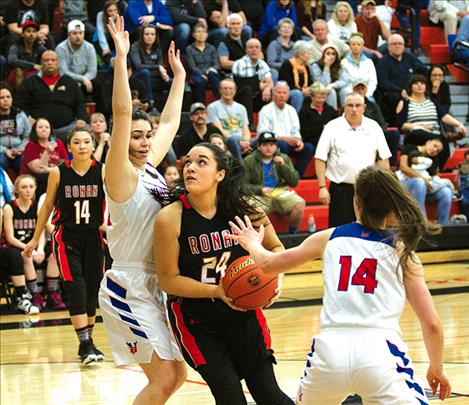 Ronan’s Alicia Camel drives the lane during a divisional game.