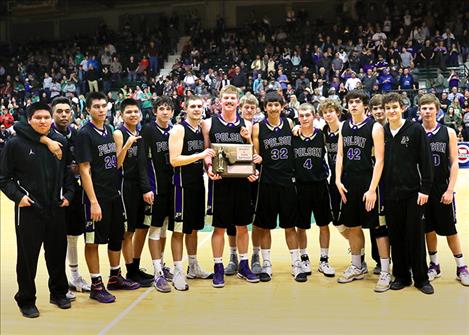 The Pirates celebrate their consolation-round win.