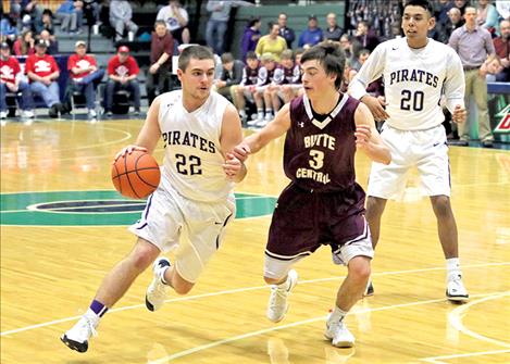 Polson Pirate Tanner Wilson cuts to the basket during the game against Butte Central.