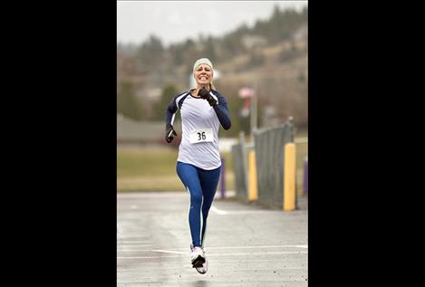 Sarah Beck Smith of Polson races toward the 10K finish line.