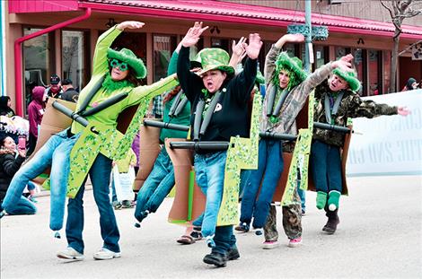 Women decked out in green walk the parade route in a homemade roller coaster. Story and photos by Karen Peterson Valley Journal see page 2 Emerald energy