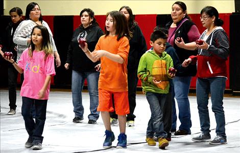 Two Eagle River families participate in the Apple Dance, inviting life-giving friendship.