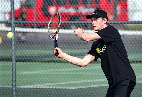 Bailey Moss returns a serve.