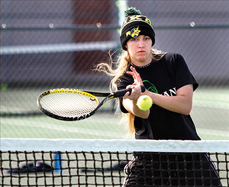 Julia Matkovich plays close to the net.