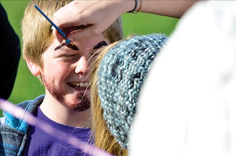 Derek Walker, 10, turns into a bearded Viking.