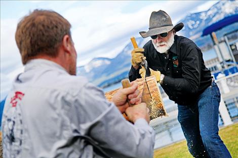 Mark Himmel and Greg Schatz compete in the cross-cut competition put on by the Back Country Horsemen on Saturday in Polson.