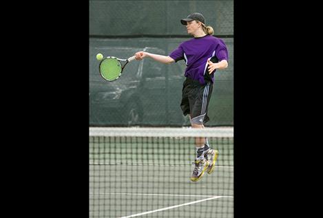 Pirates’ Cadis Chowning returns a serve during doubles action.
