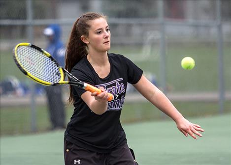 Lady Pirates’ Kyler Lundeen returns a serve during doubles action.