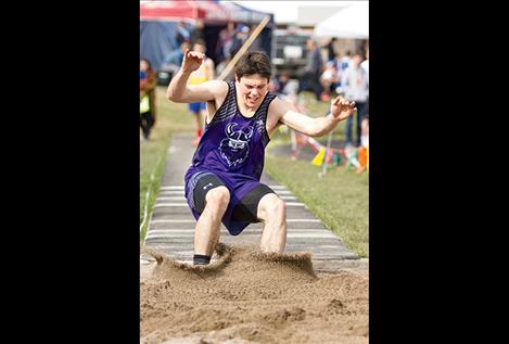 Mission’s Flint McPherson competes in the long jump.