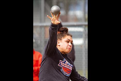 Ronan’s Micalann McCrea warms up for the shot put competition.