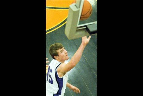 Tristan Santee makes a layup.