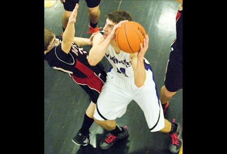 Webb O'Neill fights to the basket.