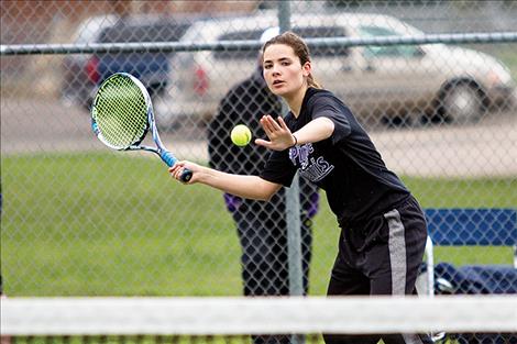 dy Pirates’ Cassie Carlyle prepares to return a serve.