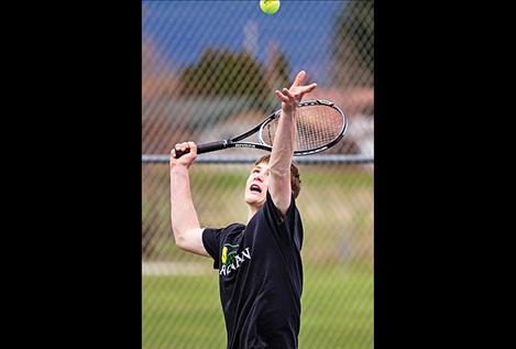 Ronan’s Bailey Moss serves during his match.