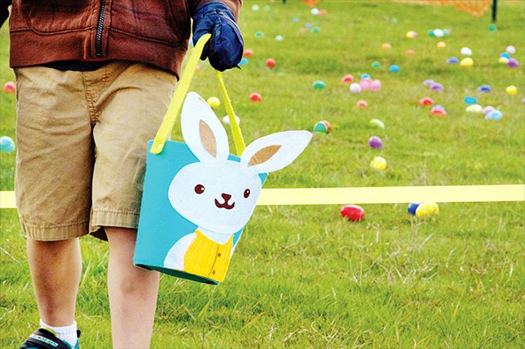Dozens of eggs are spread across the field in Polson for the annual egg hunt.