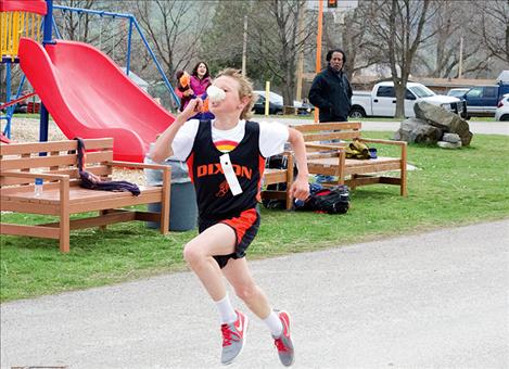 Thirteen year old Colin Elverud, an eighth grade student in Charlo, finishes first in the 10K race for the second year in a row.