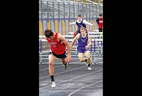 Toby Odom competes in the hurdles during a recent track event.