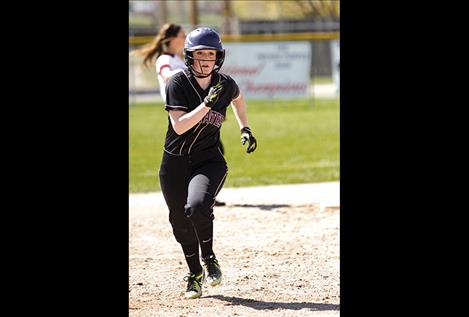 Lady Pirates’ Breyland McColl heads for third.