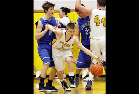 Junior Cedrick Smith charges in-bounds during Polson’s game against Corvallis Feb. 8. The Pirates won 51-48.