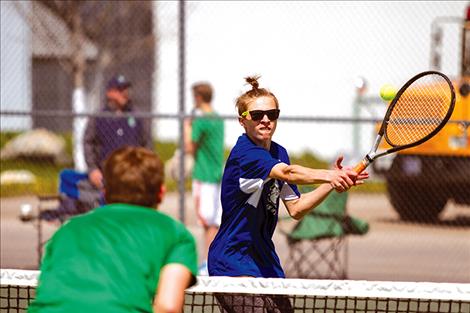 Rob Zolman/Valley Journal MAC’s Warren Castor returns a volley during doubles action.