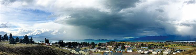 Polson's Lakeview Cemetery provides a panoramic view of approaching storm clouds.