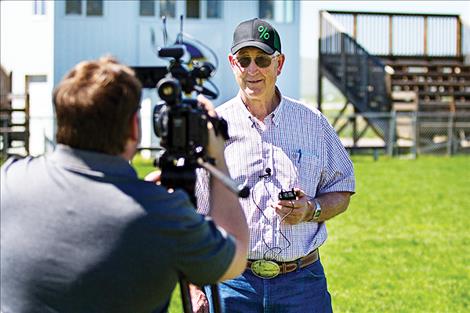 Charlo Community Outdoor Complex spokesman Harley Colman talks to media during groundbreaking ceremonies.