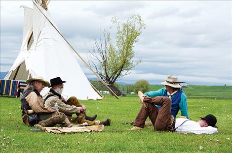 Mountain men relax during the Fort Connah rendezvous.