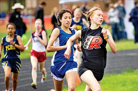 Ronan’s Ashley McCready battles Mission’s Karolyna Buck for position.