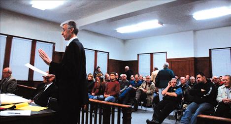 Western Montana Water Users attorney Brian Shuck presents a point for District Judge C.B. McNeil to ponder during a jam-packed hearing on Feb. 14 at the Lake County Court house. Attorney Jon Metropoulos represented the Flathead Joint Board of Control and the irrigation districts.